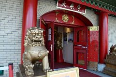 13-2 A Golden Lion Guards The Entrance To Mahayana Buddhist Temple At 133 Canal St In Chinatown New York City
